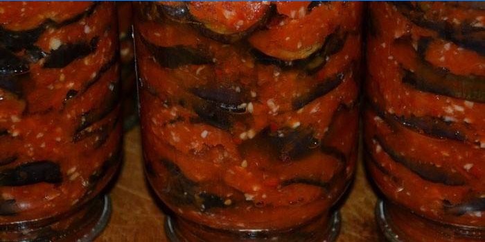 Puffed eggplant with tomatoes in jars