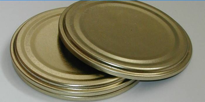 Metal lids for spinning cans