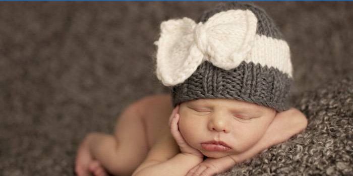 Knitted hat for knitting for a newborn baby boy