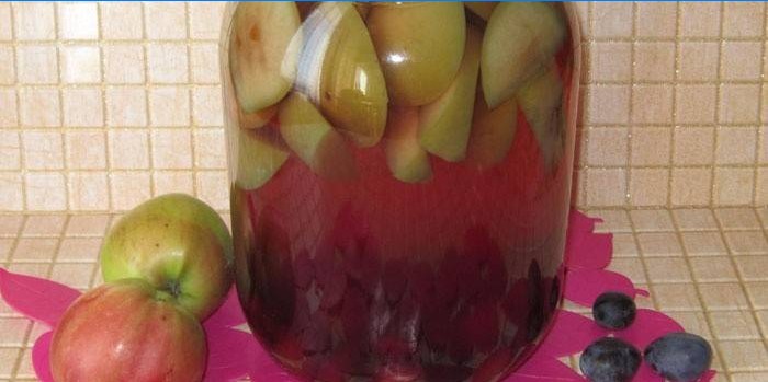Jar with apple and plum compote