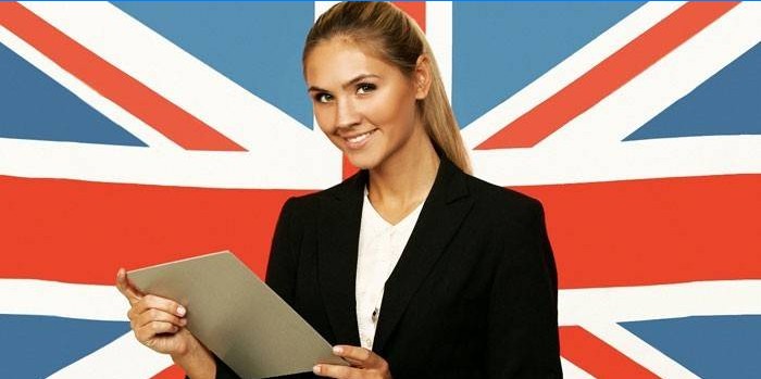 Girl on the background of the flag of Great Britain