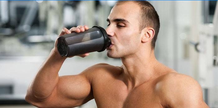 Man drinks a protein shake