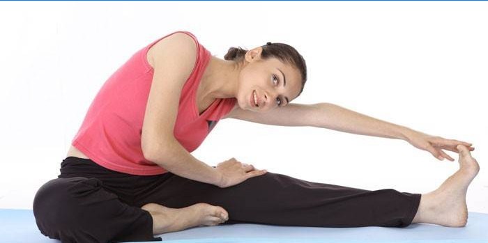 Girl doing stretching exercises