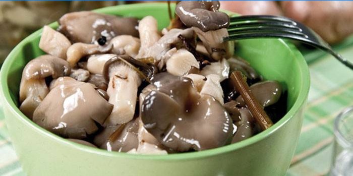 Pickled mushrooms in a deep plate