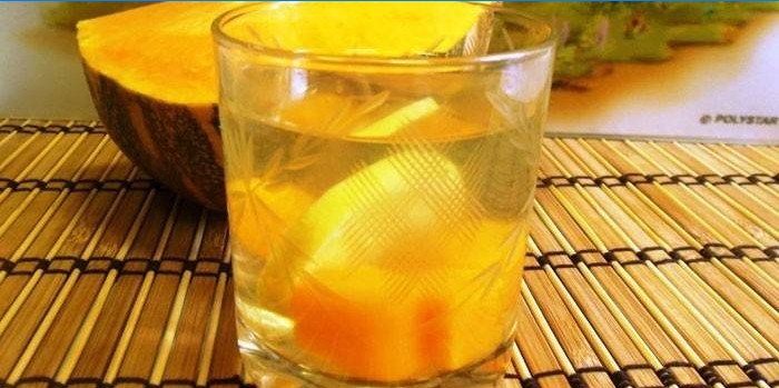 Stewed fruit with lemon in a glass