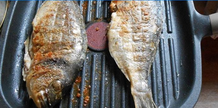 Grilled fish in a pan