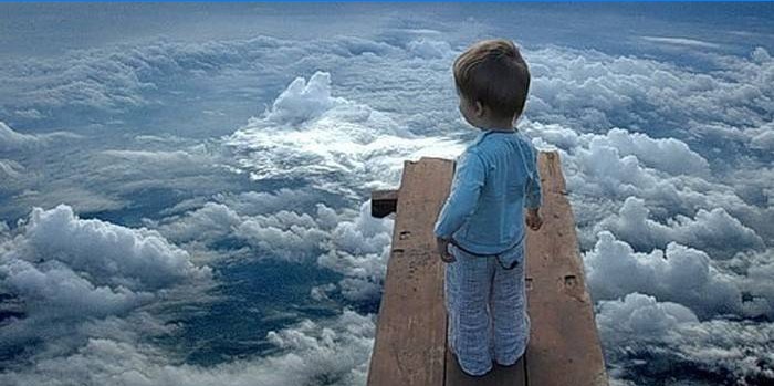 Baby above the clouds
