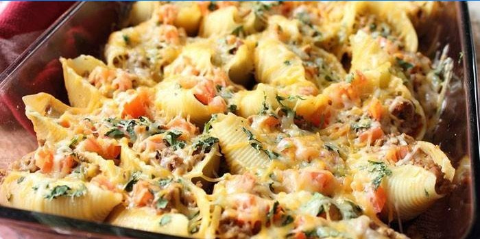 Baked stuffed shells under cheese