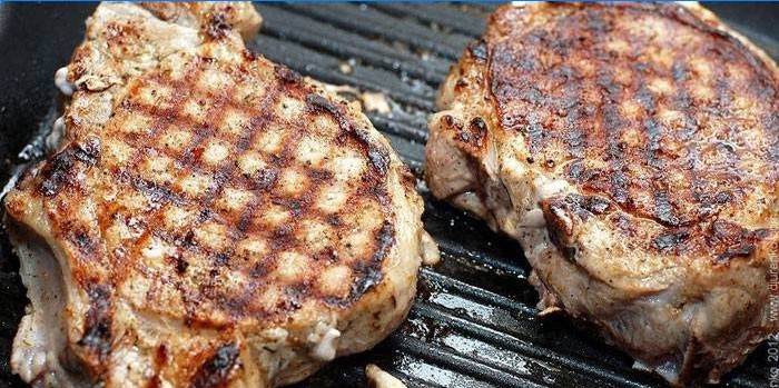 Grilled pork steaks