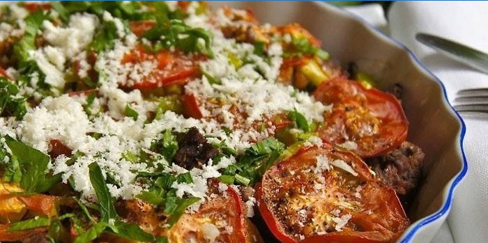 Baked meat with vegetables, mushrooms and feta cheese