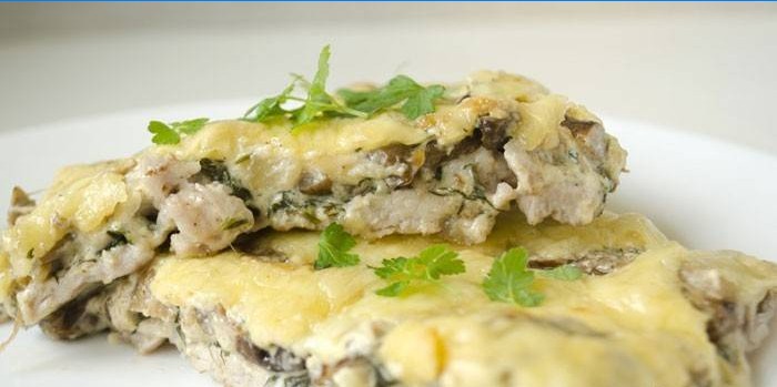 French baked meat with mushrooms