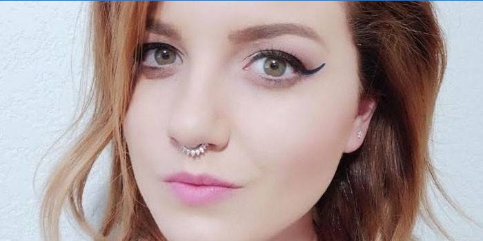 Girl with septum piercing