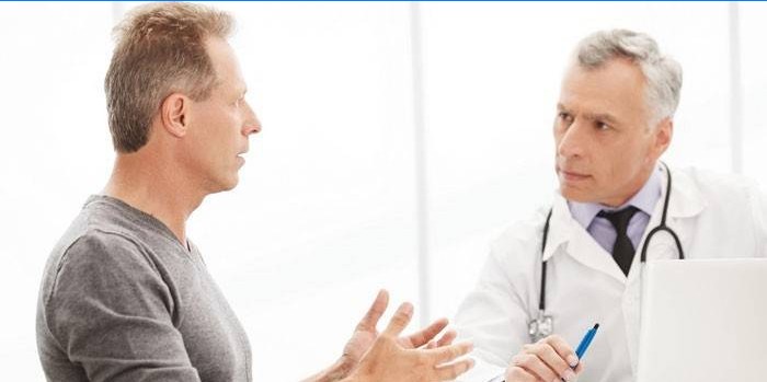 A man talking to a doctor