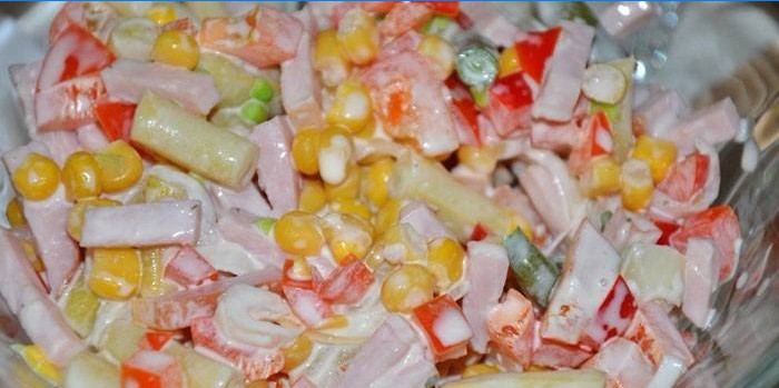 Mayonnaise salad with vegetables and ham