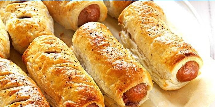 Ready-made sausages wrapped in puff pastry