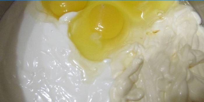 Mayonnaise and eggs in a bowl