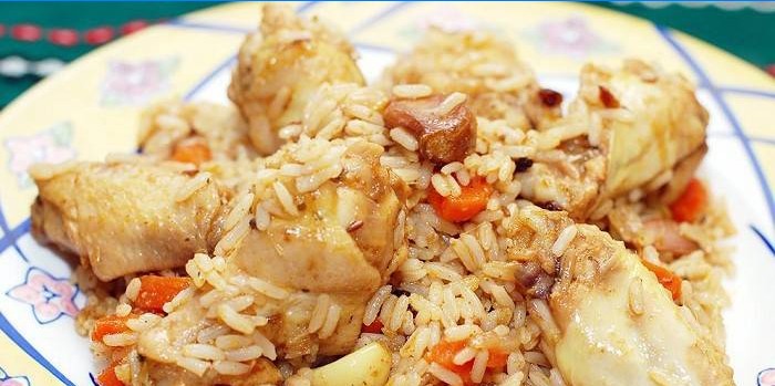 Pilaf with chicken on a plate