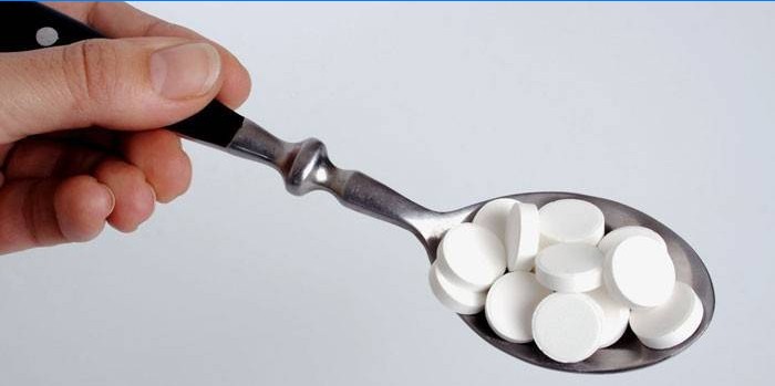 Pills in a spoon