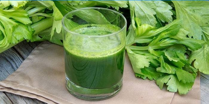 Juice from celery stalks in a glass