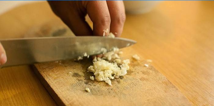 Chopped garlic on a cutting board