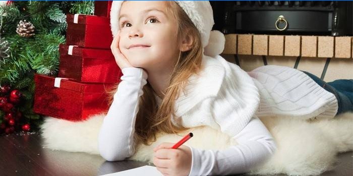 Girl writes a letter to Santa Claus