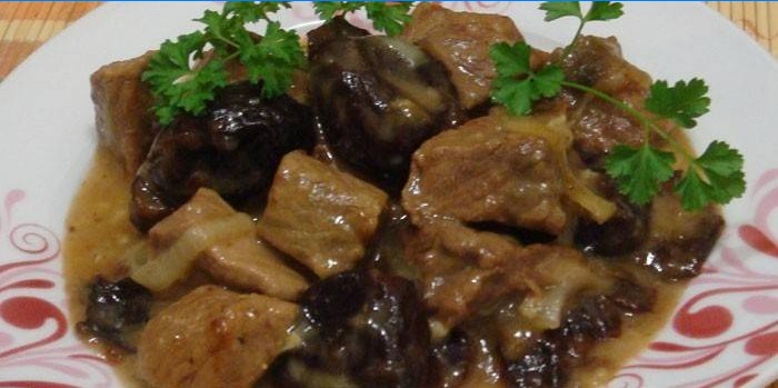 Beef stew with prunes on a plate