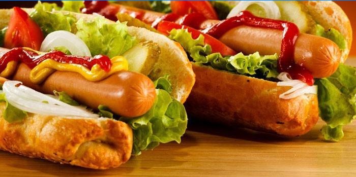 Hot dog with grilled sausages and ketchup