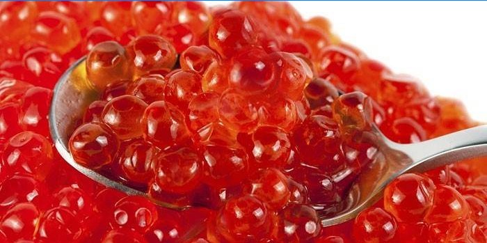 Red caviar in a spoon