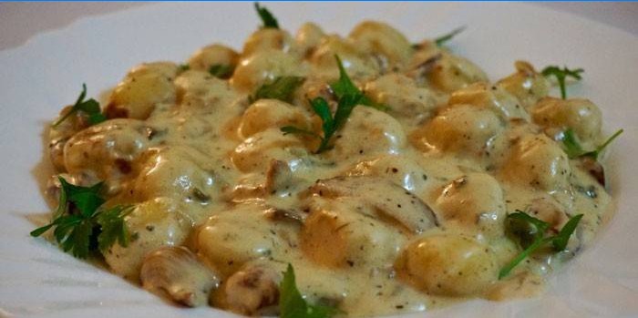 Braised turkey in a creamy cheese sauce on a plate