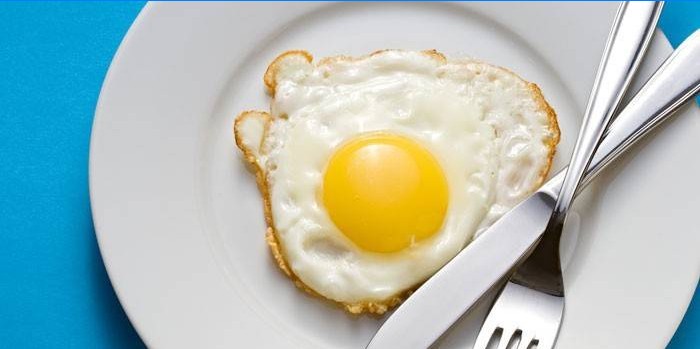 Ready-made fried eggs on a plate