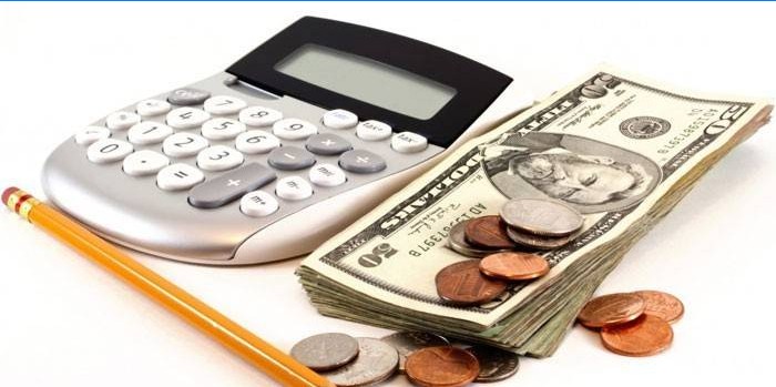 Calculator, pencil and money