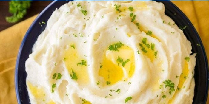 Mashed potatoes in milk with butter
