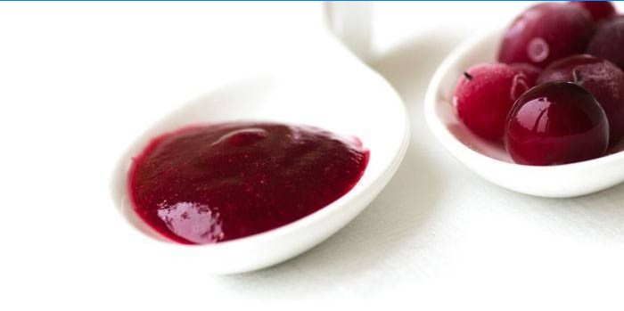 Cranberry and cranberry sauce in a spoon