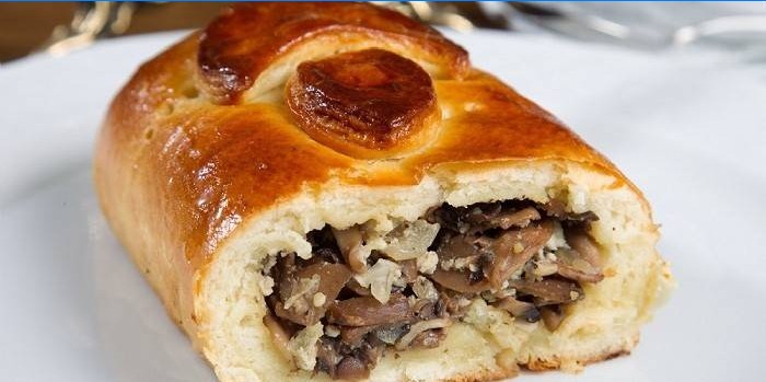 From yeast dough with meat and mushrooms