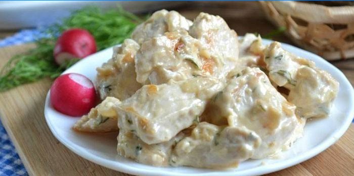 Chicken breast in cream and cheese sauce