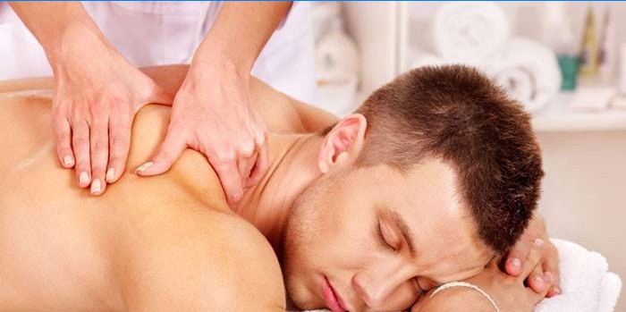 A man doing back massage