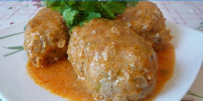 Ready-made lazy cabbage rolls with sauce on a plate