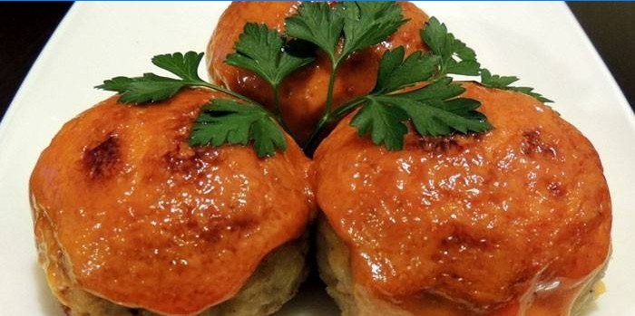 Lazy cabbage rolls with tomato and sour cream sauce on a plate