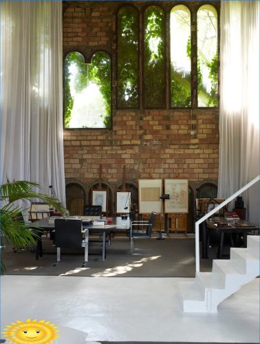 Loft style: home and office in a former cement factory