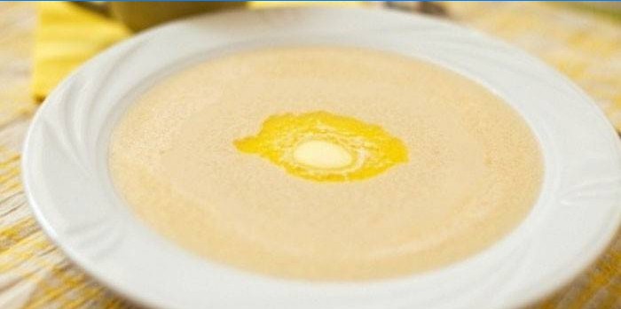 Plate of semolina porridge with butter