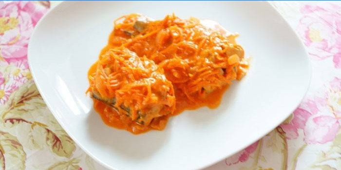 Fish marinated with carrots and onions