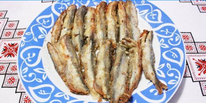Baked capelin on a plate