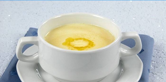 Cup with milk soup