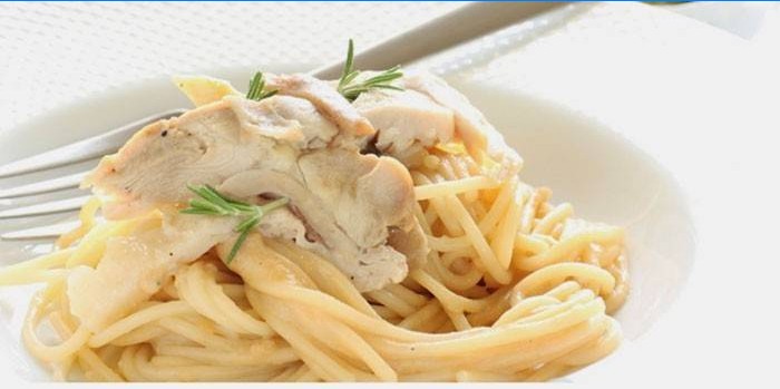 Pasta with chicken in a creamy sauce on a plate