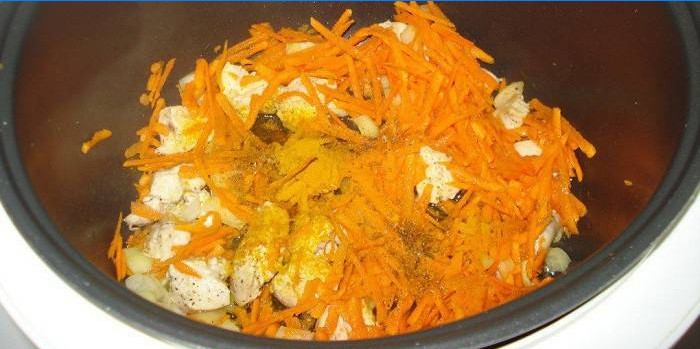 Chicken meat with carrots in a slow cooker