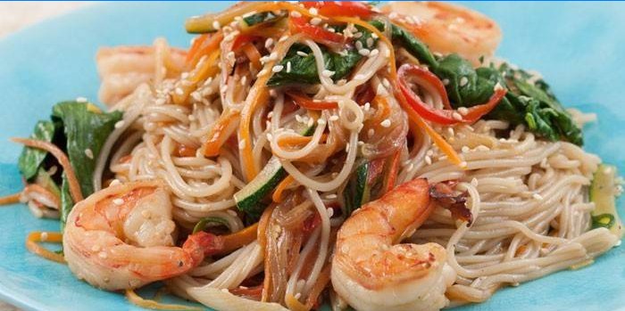 Rice noodles with sesame seeds, vegetables and shrimp