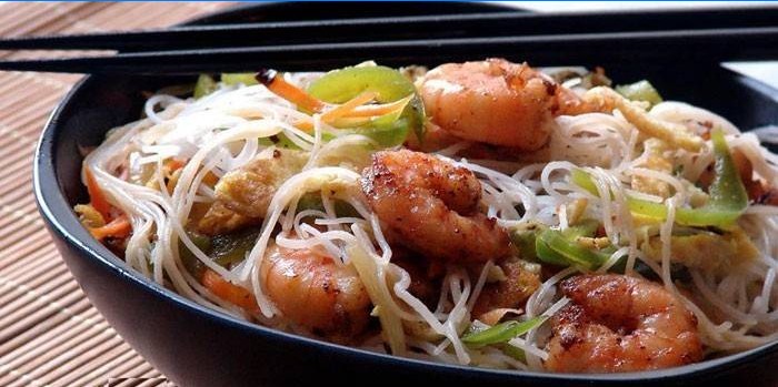 Seafood with rice noodles on a plate