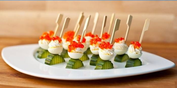 Canapes with red caviar