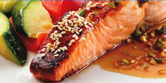 Salmon in soy sauce with sesame seeds