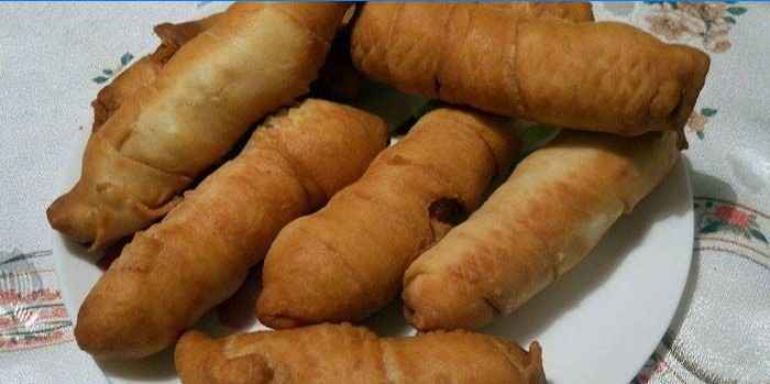 Deep fried sausages in pastry